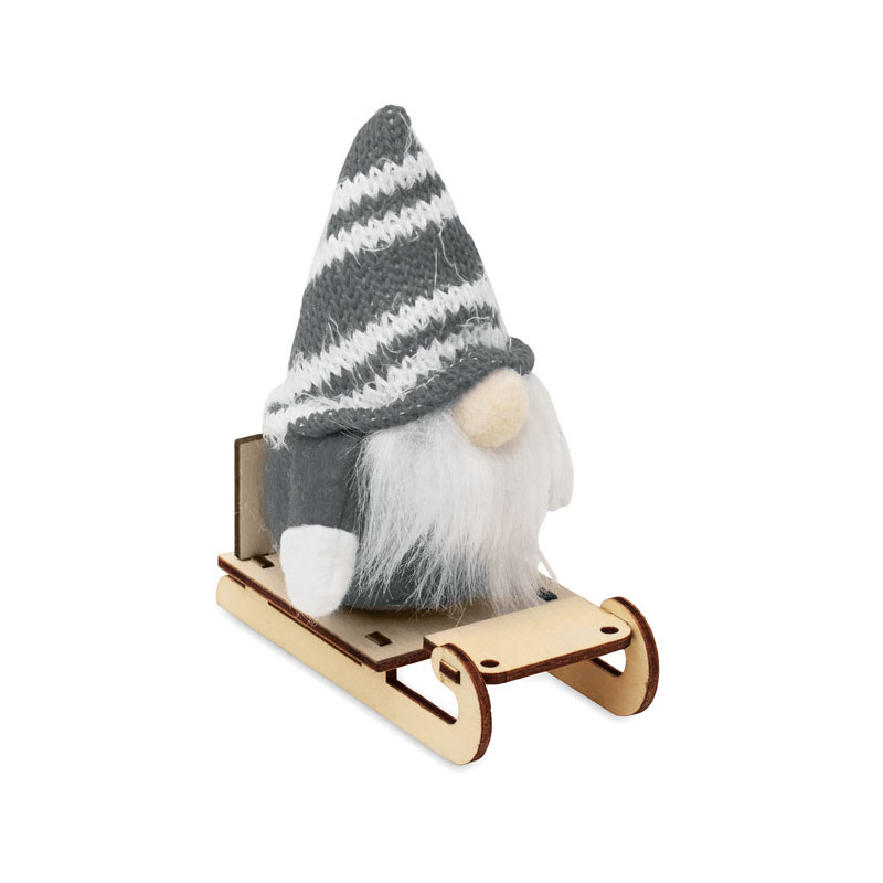 Gnomo su slitta di legno